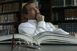 Man at desk thinking