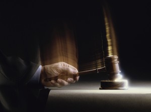 Close-up of a judge handing down a verdict