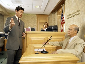 Side profile of a lawyer and a witness on the witness stand
