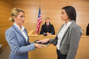 Witness taking an oath in the court room