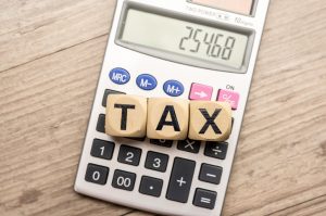 Calculator and the word tax