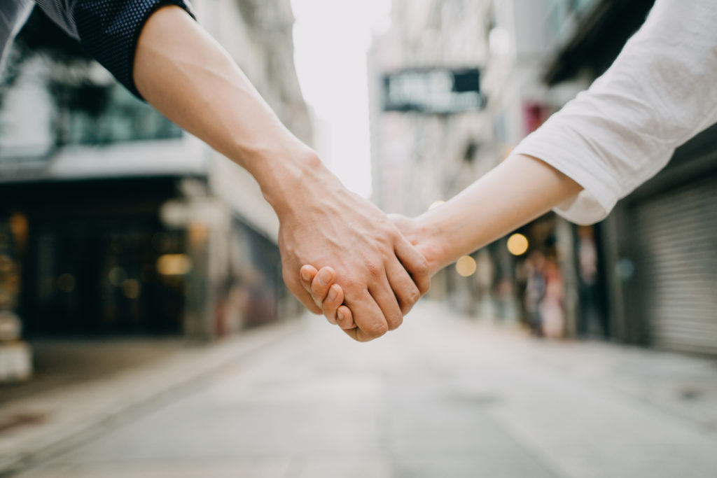 Spouses holding hands to show on blog elective care if disinherited